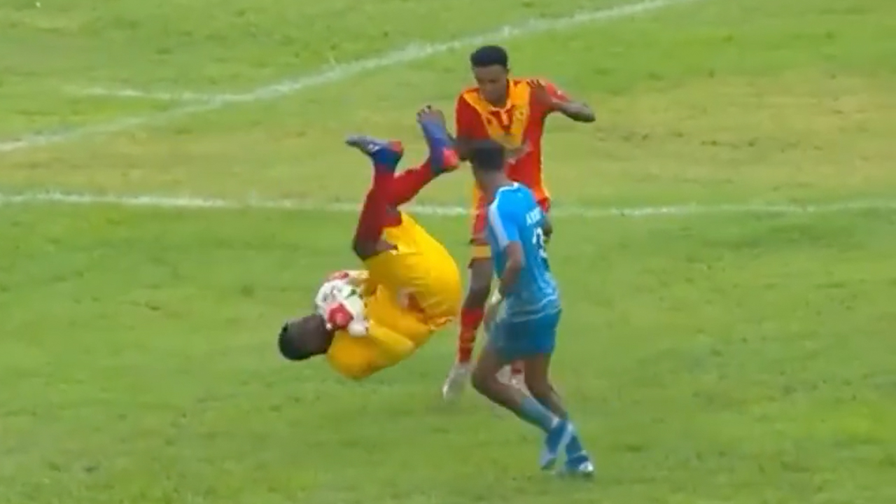 Somehow Red Goalkeeper somehow avoids red card for somersault kick on opponent